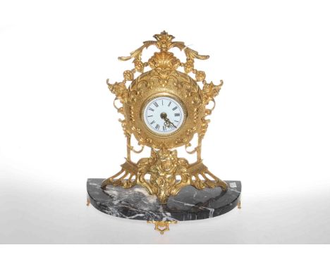 Gilt metal mantel clock on marble base