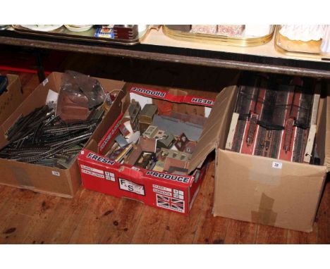 Collection of model railway equipment including track, buildings, etc