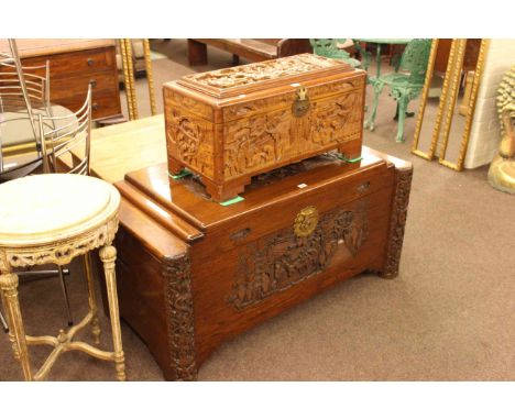 Oriental carved camphorwood trunk and smaller carved camphorwood trunk