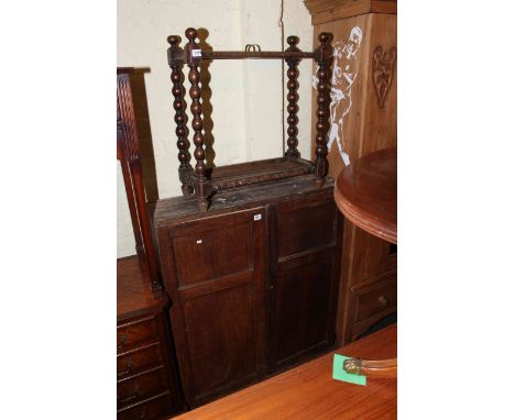 Oak bobbin pillar stick stand and oak two door cupboard