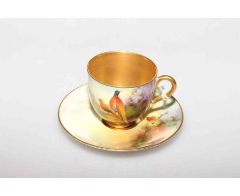 Royal Worcester hand-painted coffee cup and saucer, the cup signed Shuck