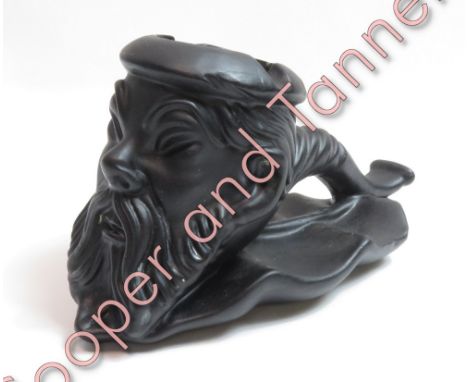 A black ceramic ashtray in the form a meerschaum pipe, along with a Gurkha Infantry Brigade plaque, Treen container and an Ay