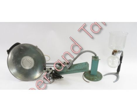 A vintage “Allen “dentist light with a flexible arm, along with a spotlight, heater and various other dentistry items