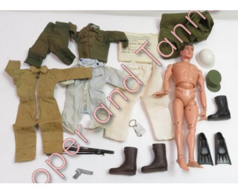 A vintage Action Man figure, together with various accessories