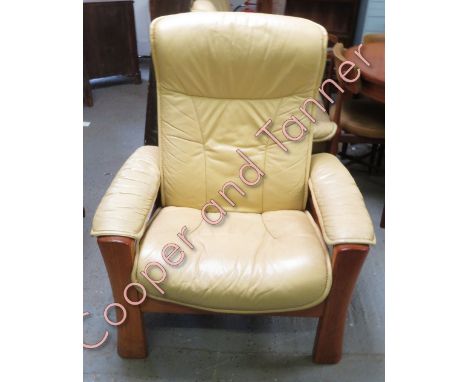 A Ekorness three piece suite, to include two seater sofa, armchair and footstool