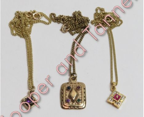A 9 carat gold pendant on chain, matching the earstuds in lot 95;  another gem set 9 carat gold pendant on a chain matching a