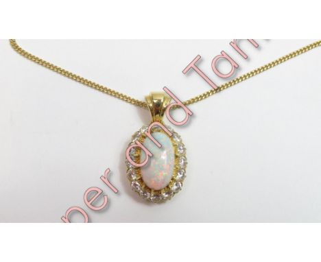 An opal and diamond pendant on chain, the oval cabochon cut opal, approximately 14.5mm by 8.4mm by 4.8mm, enclosed by sixteen