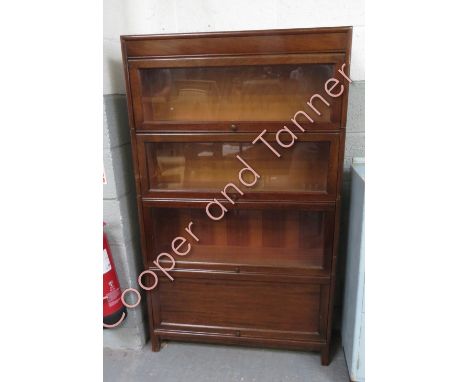 A four section Globe Wernicke style bookcase, 146cm high, 86cm long, 25cm deep