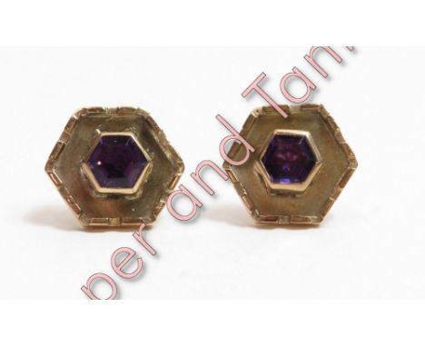 A pair of 9 carat gold amethyst earstuds, the hexagonal cut stone to a similarly shaped wide mount, 4.5 g gross