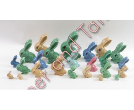 A collection of twenty three ceramic rabbits, mostly Sylvac examples