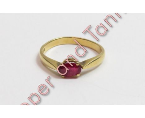 An 18 carat gold single stone ruby ring, finger size N, 2.8 g gross