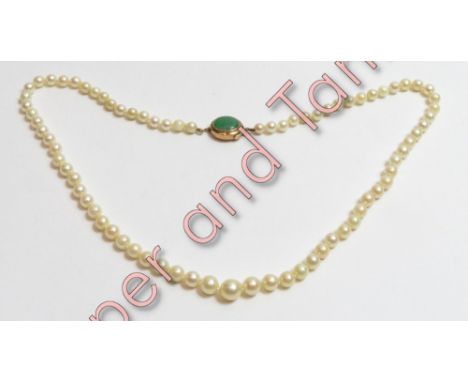 A slightly graduated row of cultured pearls, the seventy seven pearls of approximately 5 mm-6.5 mm and the central pearl of 8