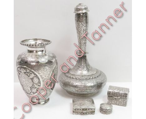 An Egyptian white metal trinket box, along with white metal bottle vase and one other vase, 835 grams gross