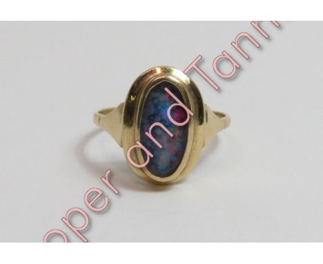 A 9 carat gold opal triplet dress ring, finger size T ½, 3.1 g gross