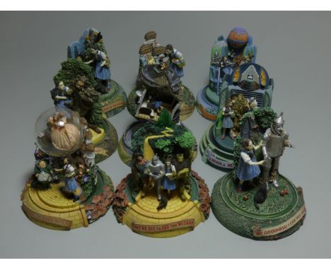 A set of nine Wizard of Oz Franklin mint figures, six with certificate of authenticity, also including a wedgewood figure (10