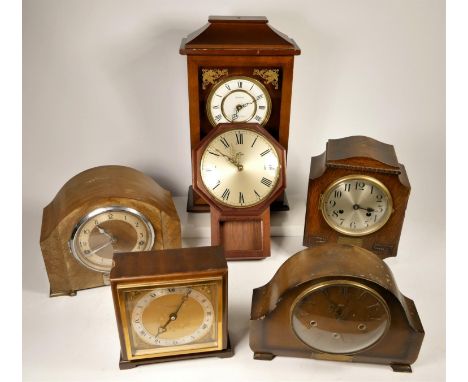 A collection of clocks to include, a Spectrum Quartz-Chime mantel clock, a Coronet wall clock and others (2) 