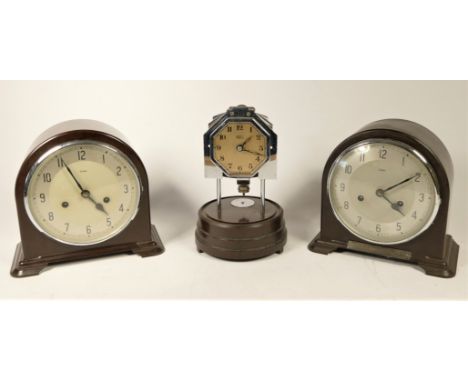A Bulle manual wind mantel clock together with two Bakelite Enfield mantel clocks, and a selection of electric clocks to incl