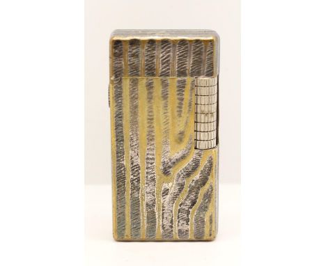 A Dunhill 70 rollagas lighter, c.1970's, with textured body, booklet, pouch and box 