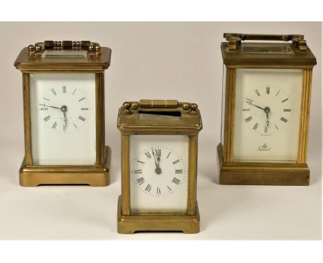 Three brass manual wind carriage clocks to include, E.A.Baker LTD, London, Imperial and a miniature carriage clock (3) 