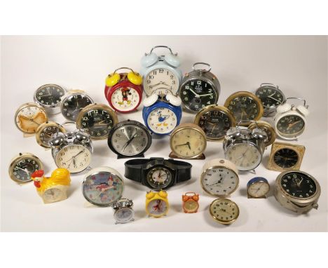 A collection of alarm clocks to include, Westclox Big Ben repeater, a Mickey Mouse alarm clock, Westclox Baby Ben alarm clock