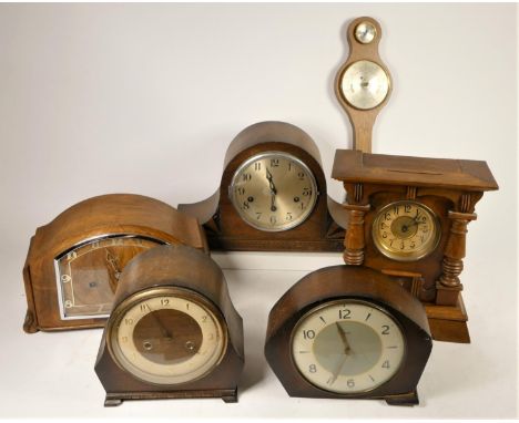 A collection of mantel clocks to include, a Swiza 8 day mantel clock, Angelus and other wooden mantel clocks. (2) 