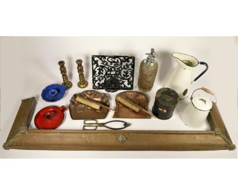 Two copper Beldray art nouveau crumb trays with brushes, a brass fender, enamel wares and others. 