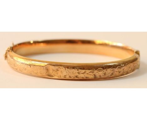 A 9ct rose gold bangle, 8.5gm 