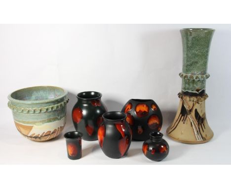 Five pieces of galaxy pattern Poole pottery to include, a purse vase and four smaller vases, together with an ironstone textu