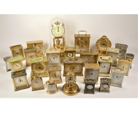 A collection of clocks to include, Woodford, London Clock Co., Eurostyle, Churchill and other quartz carriage and mantel cloc