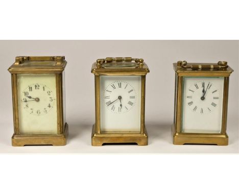 Three brass manual wind carriage clocks, unmarked. 