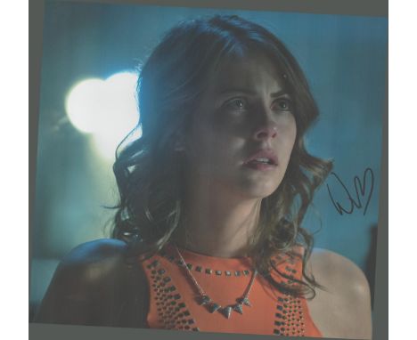 Actor, Willa Holland signed 10x8 colour photograph pictured during her role as Thea Queen / Speedy in Arrow. Good condition. 