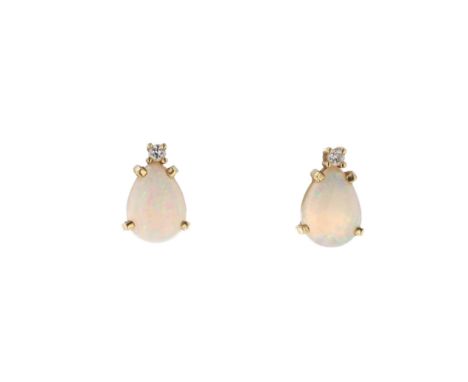 Diamond And Opal Gold Stud Earrings, tested 18ct. Measure 1.2cm by 0.7cm. Earrings backs are not original, evidence of dremel