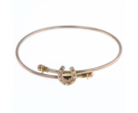 Antique Gold Horseshoe Bypass Bangle, tested 6ct. Measures 5.6cm internal diameter. Adjustable to some extent. Weighs approxi