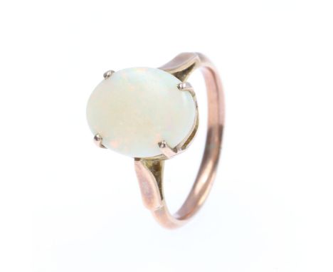 Opal Gold Cabochon Cocktail Ring, tested 9ct. Ring size UK N. Some surface wear to the stone, minimal surface scratches to th