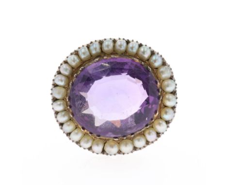 Amethyst And Pearl Gold brooch, tested 9ct. Measures 1.8cm by 2cm. Pin and clasp are later additions. Weighs approximately 5.