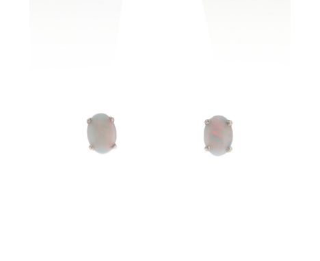 Opal White Gold Stud Earrings, tested 9ct. Measures 5mm by 7mm. Weighs approximately 1.2g