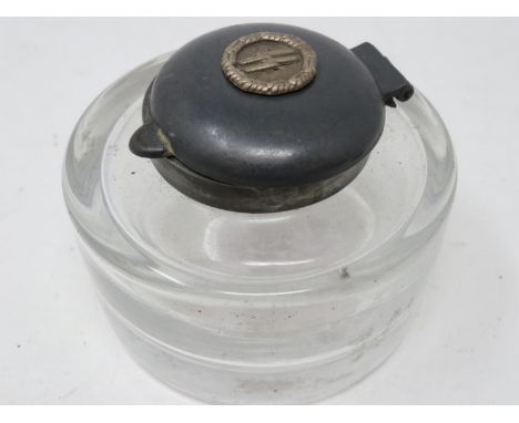 Glass inkwell with gunmetal hinged lid, surmounted with an SS badge. UK P&amp;P Group 1 (£16+VAT for the first lot and £2+VAT