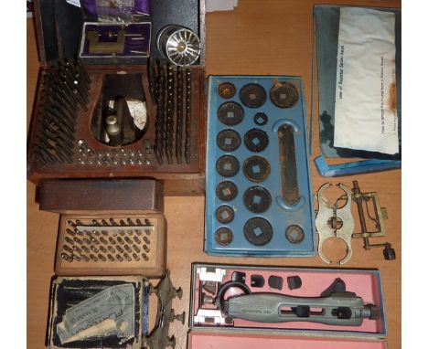 Cased watch and clock makers stan press tool?? with various bits, vices, calipers, flat lock, cleft universal and boxed Tisso