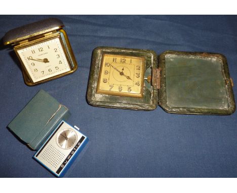 Cased Tempora Germany travelling alarm clock, another leather cased alarm clock and cased Mikla Sumatic alarm clock (3)