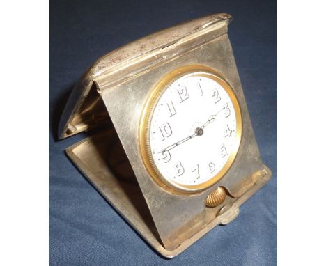 Birmingham silver hallmarked cased travelling clock, the hinged case revealing easel 8 day Swiss made clock  