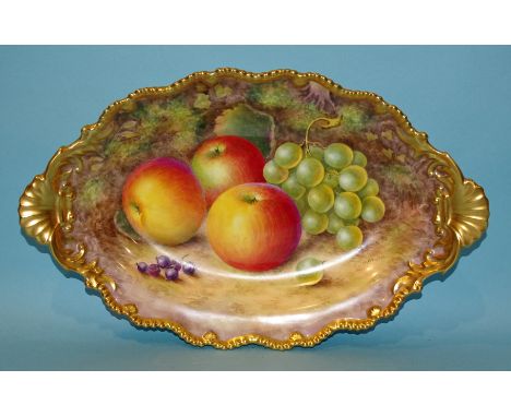 A Royal Worcester two-handled oval dish, hand-painted with apples, grapes and blackcurrants on a mossy ground, signed H Ayrto