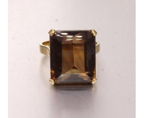 A yellow gold dress ring set large brown citrine, the mount bearing Egyptian marks for 18ct, size O, 8.5g. 