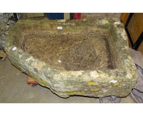 A Cotswold stone trough of rectangular form, with one chamfered corner, 86 x 60cm. 