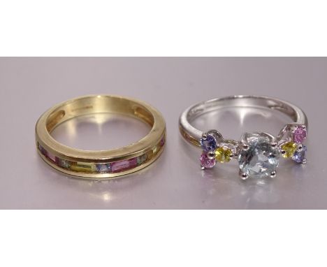 Two 9ct gold rings set coloured gems, both marked 'QVC', sizes K½ and M, 5g, (2). 