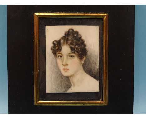 Dorothy Bartlett (b. 1902) An early-20th century rectangular portrait miniature of a young woman with dark curls, 72 x 59mm, 