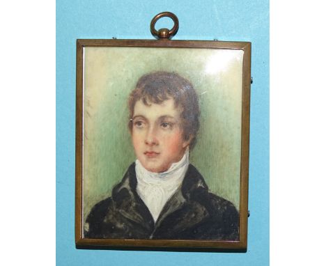 Dorothy Bartlett (b. 1902) An early-20th century portrait miniature of a young man wearing a white stock and black coat, 75 x