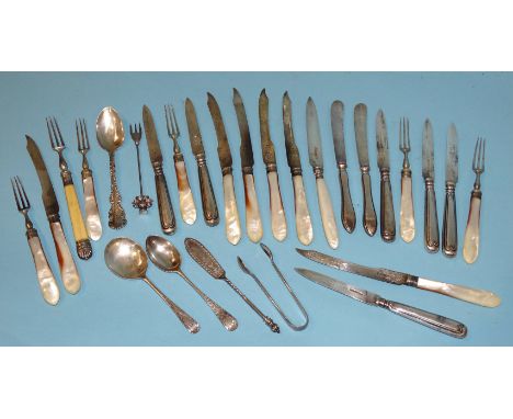 A collection of miscellaneous silver flatware and mother-of-pearl-handled fruit knives and forks. 