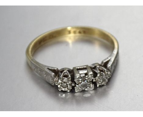 An 18ct gold ring illusion-set three 8/8-cut diamonds, size L, 2.5g. 