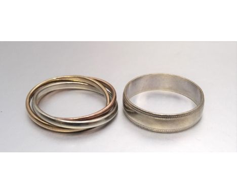 A 9ct tri-colour gold Russian wedding ring, size M and a 9ct gold wedding band, size P, total weight 5.1g, (2). 