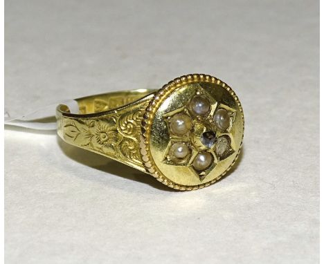 A Victorian mourning ring set rose-cut diamond and demi-pearl cluster, (one pearl setting vacant, one damaged), with locket b